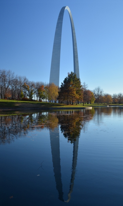 reflection of the arch in the reflecting pool